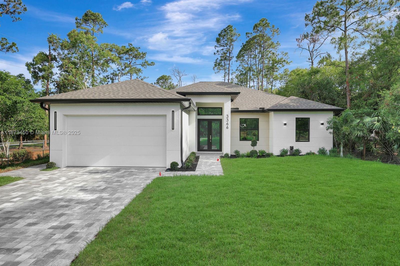 BRAND-NEW HOME on a 1.14-acre 100% upland lot, with 1,774 sq. ft. A/C living area and 2,950 sq. ft. under roof. Constructed residence 2025.It features 4 bedrooms and 3 full bathrooms,the kitchen with quartz countertops,waterfall island,soft-close cabinets,and high-end stainless steel appliances. There are custom built-in closets in every bedroom. The two-car garage boasts an epoxy finish.Includes a reverse osmosis water purification system.The kitchen,bathrooms,exterior paver floors,and spacious backyard highlight.You can building a pool or guest house; there is no HOA and no restrictions for pets.If you seek quality of life surrounded by nature,close to the beach,in a peaceful.Just minutes from the City of Ave Maria and Naples, restaurants, top schools, and beaches.HOME WARRANTY INCLUDED!