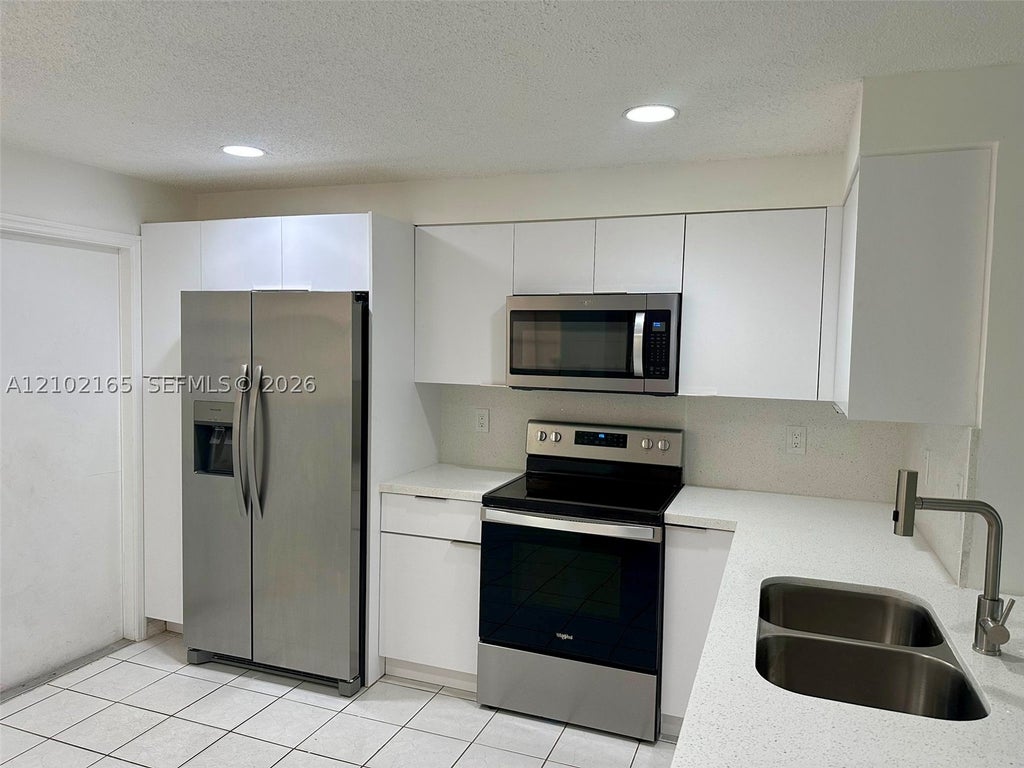 Photo of 1401 Veracruz Ln, Weston, FL 33327 (MLS # A12102165)