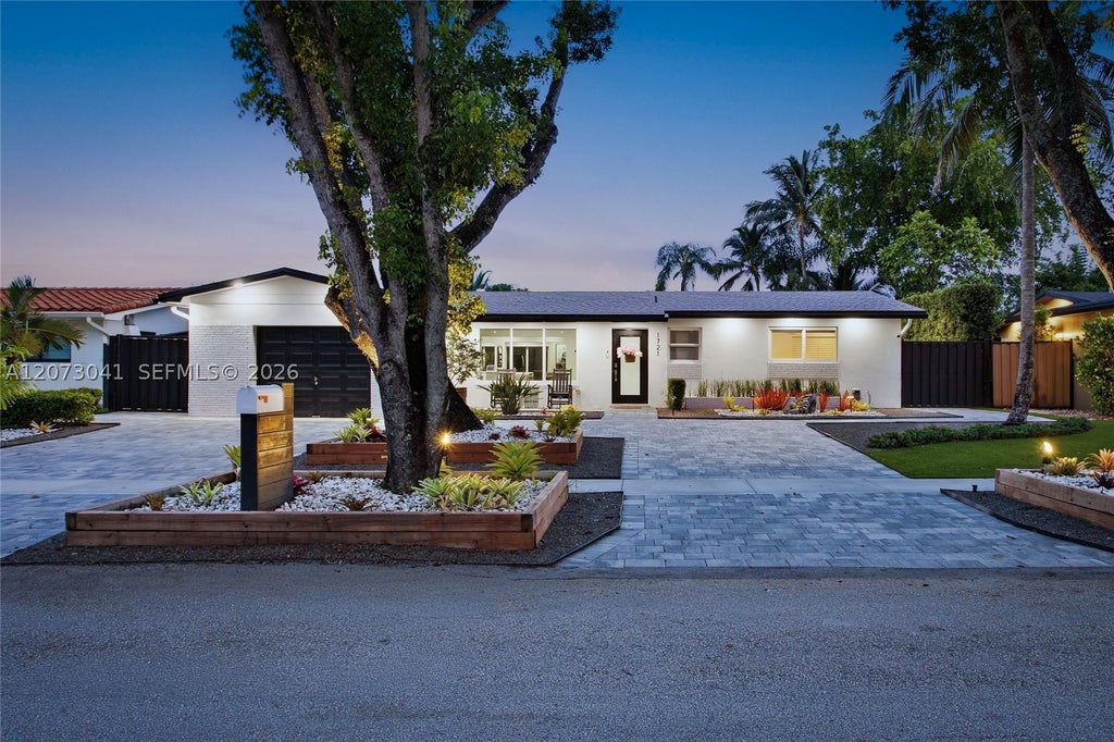 Photo of 1721 NW 114th Ave, Pembroke Pines, FL 33026 (MLS # A12073041)