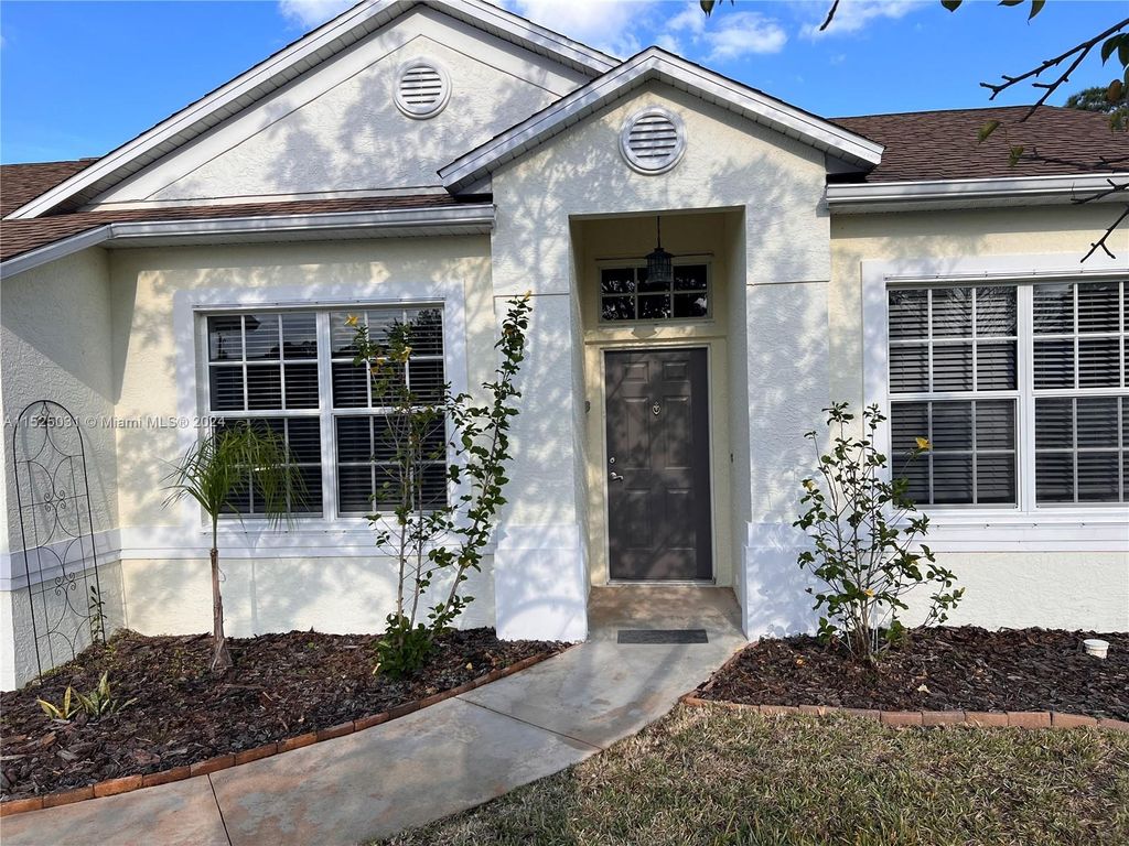 Photo of 665 NE Horizon Ln, Port Saint Lucie, FL 34983 (MLS # A11525031)