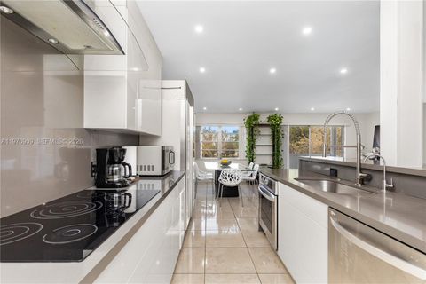 Photo of 1400 N Tallwood Ave #306, Hollywood, FL 33021 (MLS # A11976909)