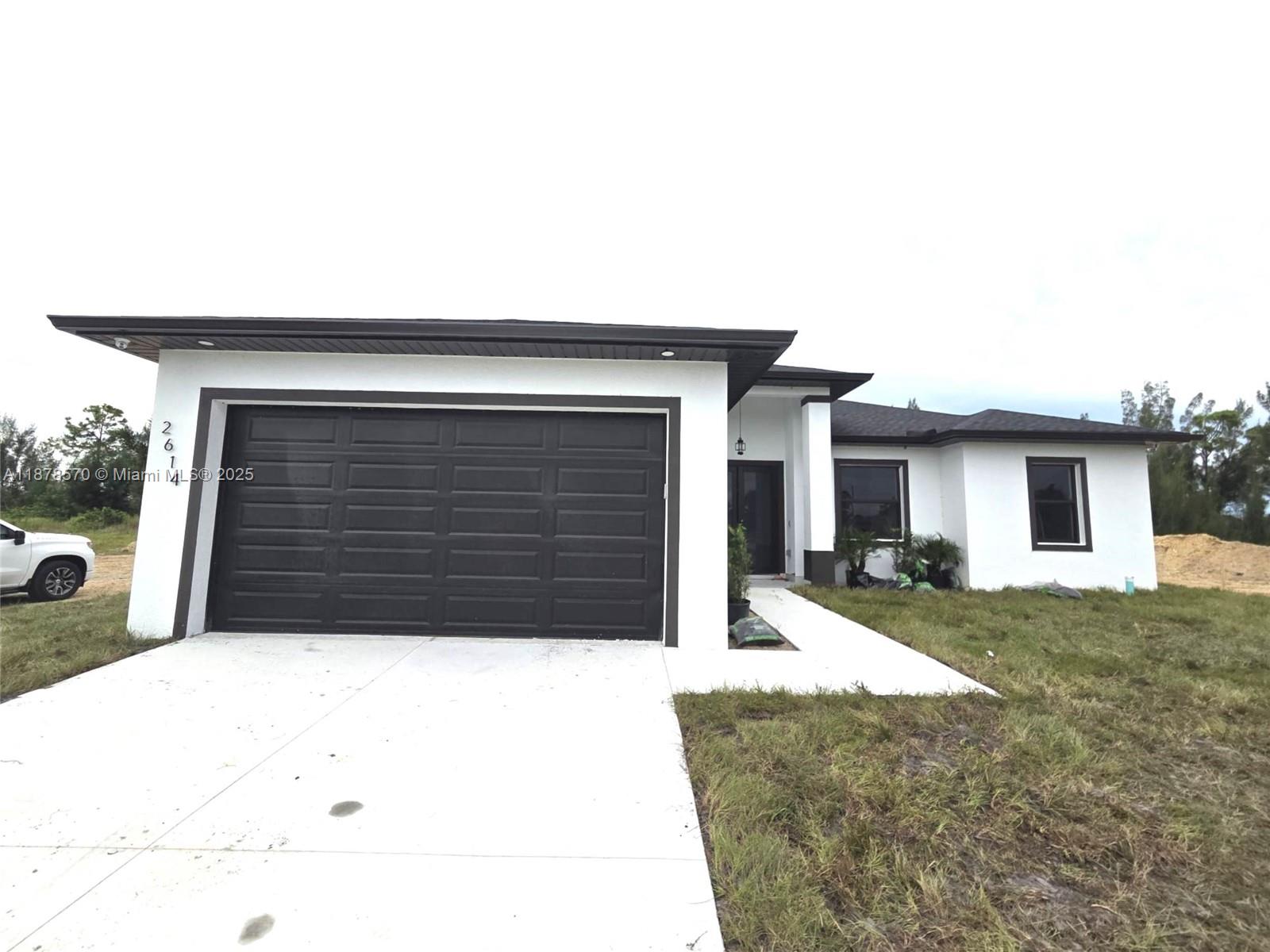 BRAND NEW HOME IN GROWING AREA IN CAPE CORAL. THIS FABULOUS 4 BEDROOM 2.5 BATH HOME IS CANAL FRONT WITH A FORTIFIED NEW SEA WALL. LOCATED IN A 10,000 SQ FT LOT WITH ROOM FOR A POOL. BRAND NEW KITCHEN WITH TOP OF THE LINE APPLIANCES WITH QUARTZ COUNTER TOP AND A RAINFALL QUARTZ ISLAND. OUTSIDE KITCHEN THAT INVITES FOR FAMILY AND FRIENDS GATHERINGS. SPACIOUS FLOOR PLAN TILED THROUGH OUT WITH MODERN TOUCHES ALL AROUND. SMART HOME WITH CAMERA SYSTEM INCLUDED!
IMPACT WINDOWS AND MUCH MORE! IDEAL FOR A FAMILY OR FOR AIRRNB WILL MAKE THE PERFECT INVESTMENT. NO HOA! NO CDD! *GPS* ***SELLER WILL CONTRIBUTE WITH $10,000.00 TOWARDS BUYER'S CLOSING COSTS***