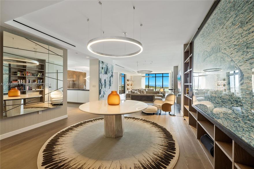 First Time Ever on the Market at Palazzo Del Sol on Fisher Island! Introducing One-of-a-Kind Gem Turnkey Designed by HENGE ITALIA.  This exquisite 3,793 SF residence features 3 beds + 3.5 baths, showcasing unparalleled Italian craftsmanship that merges modern sophistication with timeless elegance. The flow-through layout offers stunning ocean vistas alongside views of the golf course & Miami's skyline. Every detail has been thoughtfully curated, from the Boffi kitchen + Gaggenau &   Sub-Zero appliances, Lualdi doors & Listone Giordano wide-plank oak floors—each reflecting a commitment to quality and style. For families, there’s a private school, ensuring top-tier education within this exclusive community. With unmatched amenities and security, Fisher Island epitomizes luxury living.