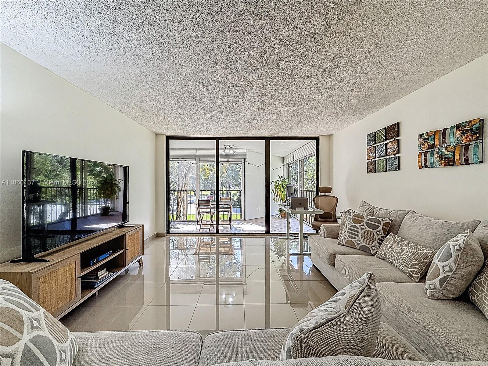Corner Unit located in the desirable Country Club Village at Weston! This stunning 2-bedroom, 2.5-bath home has been well-maintained and includes a renovated bathroom, a spacious laundry room, and additional storage outside the unit. Enjoy peace of mind with a newer A/C system.
The community offers a pool and tennis courts just steps from your building. Plus, as an owner, you’ll have access to the Bonaventure Town Center Club, featuring state-of-the-art fitness facilities, lifestyle classes, café, indoor bowling, business center, tennis, pickleball, two pools, and so much more.
