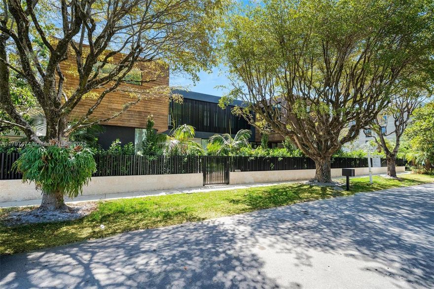 Discover Coconut Grove's newest gem, a Tulum-inspired architectural masterpiece nearing completion on a coveted corner lot. Just steps from vibrant Downtown Coconut Grove, top-tier private schools, upscale shopping, and exquisite dining, this tropical oasis redefines luxury living. Floor-to-ceiling sliding glass doors merge serene outdoor spaces with elegant interiors, creating an entertainer’s paradise. Highlights include a rare basement with a chic wet bar, a sumptuous primary suite with dual walk-in closets and a spa-like bathroom, a gourmet chef’s kitchen with a walk-in pantry, and a two-car garage. Evoking Tulum’s organic elegance, the design blends natural materials with modern sophistication. With construction concluding soon, this one-of-a-kind estate awaits its visionary owners.