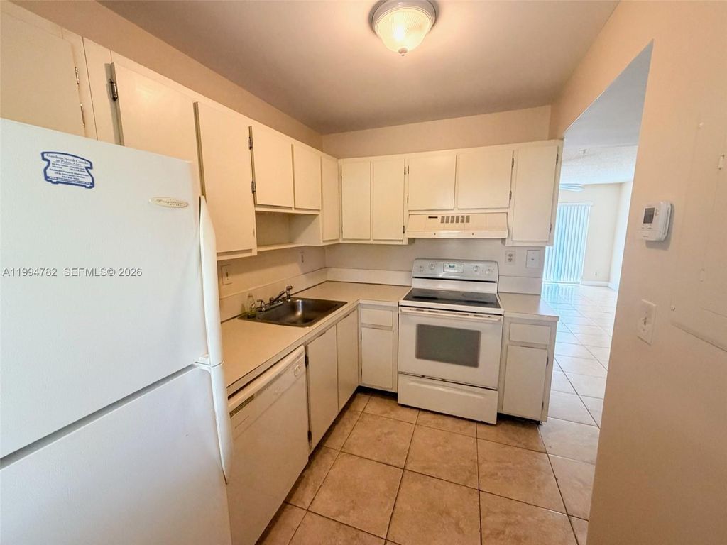Photo of 109 Gardens Dr #203, Pompano Beach, FL 33069 (MLS # A11994782)
