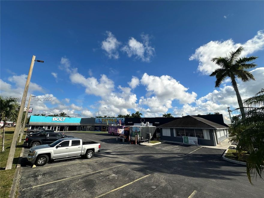 Prime commercial retail center just off the Florida Turnpike offering exceptional visibility along a high-traffic corridor. This busy plaza offers strong traffic flow, ample parking, and a mix of established neighboring businesses, perfect for maximizing exposure. Ideal for retail, industrial, or food-related ventures looking to thrive in a high-demand corridor. Also, a great opportunity and location to build and develop to your taste as this area is growing rapidly. Convenient access to major highways and commercial centers. Permitted Signage exposure to Florida turnpike brings additional income to your investor. Bring your business to one of the area’s most active commercial hubs! DO NOT DISTURB TENANTS!