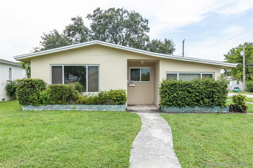 MOVE-IN READY! This 3 bedroom/2 bathroom home has been recently renovated and is located in the heart of Miami. Corner lot, Impact windows throughout, Oversized Master bathroom and walk-in closet and laundry room under A/C! **Property is essentially a 2/2 according to Tax Roll. However, den area was used as a third bedroom by all previous tenants. Adding a sliding door would be extremely inexpensive and would turn the den into a spacious 3rd bedroom! NO illegal additions. Property is completely in compliance with code.**