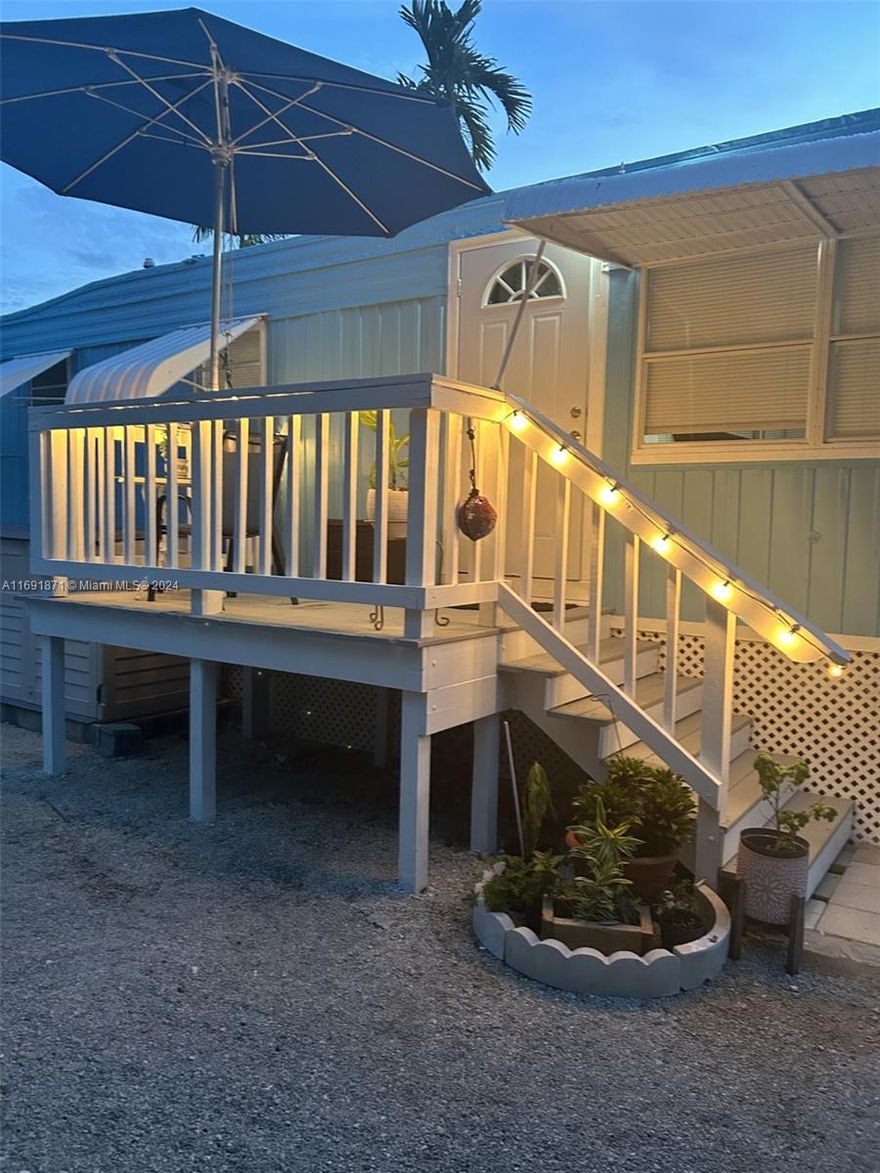 Charming Mobile Home nestled in the heart of the Florida Keys. This 1-bedroom, 1-bathroom is the perfect home for boating lovers with a private dock that allows you to access the beautiful clear waters of the Keys. Inside, the home features a comfortable space with plenty of natural light. Fishing, boating and diving or just relax with breathtaking sunsets. Call today!