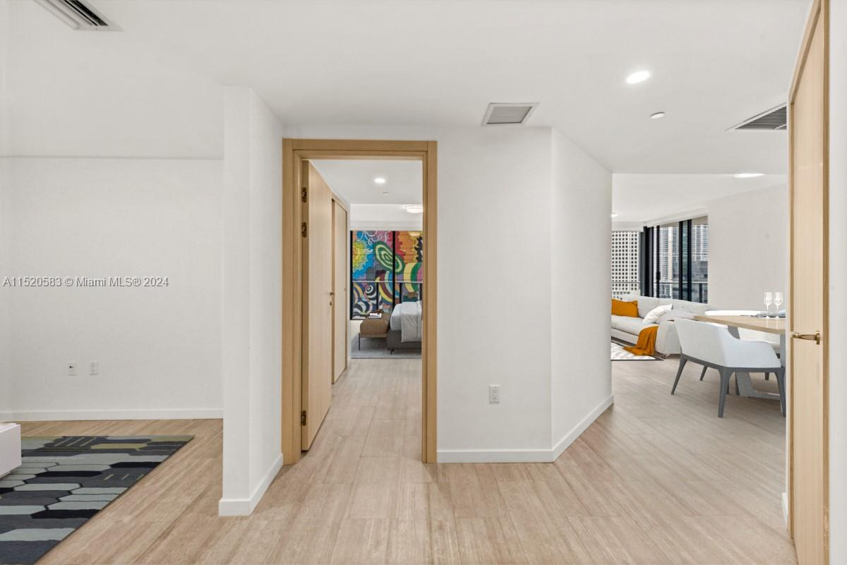 Enjoy this beautiful corner unit in Flatiron at Brickell, with 2 bedrooms, 2.5 baths, and a den in a gorgeous building: open kitchen, wraparound balcony, and skyline vistas. Live and play in this luxury building with the best amenities in the city: Sky club rooftop on the 64th floor offering Pool with 360-degree views of Miami and Biscayne Bay, fitness center with the city's best views, and wellness Center and spa. Flatiron Club on the 18th & 17th floors offers a private movie theater, outdoor lap pool, children's playroom, social lounge room, valet parking, billiards room, & concierge service. Ready to move in.
Driving Directions:
