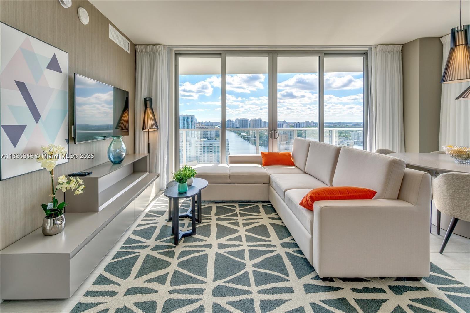 Price Drastically Reduced! Best Deal on a 3-Bedroom corner Unit! Daily/short-term rentals allowed, plus, you have the flexibility to choose any management company! This fully furnished unit boasts modern finishes, a luxury kitchen, and spa-inspired bathrooms. Spacious layout offering 1,361 sq ft, it provides breathtaking South Florida Intracoastal views from your corner balcony facing both south & west. Enjoy top-tier features like: Bosch & Sub-Zero appliances, Italian cabinetry and quartz countertops. This is a 5-star luxury residence offering exclusive resort-style amenities, including: Oceanfront private Beach Club, Pool deck with semi-private cabanas, Relaxing spa, Stunning infinity pool, making this an incredible opportunity for the right buyer! Seller financing available.