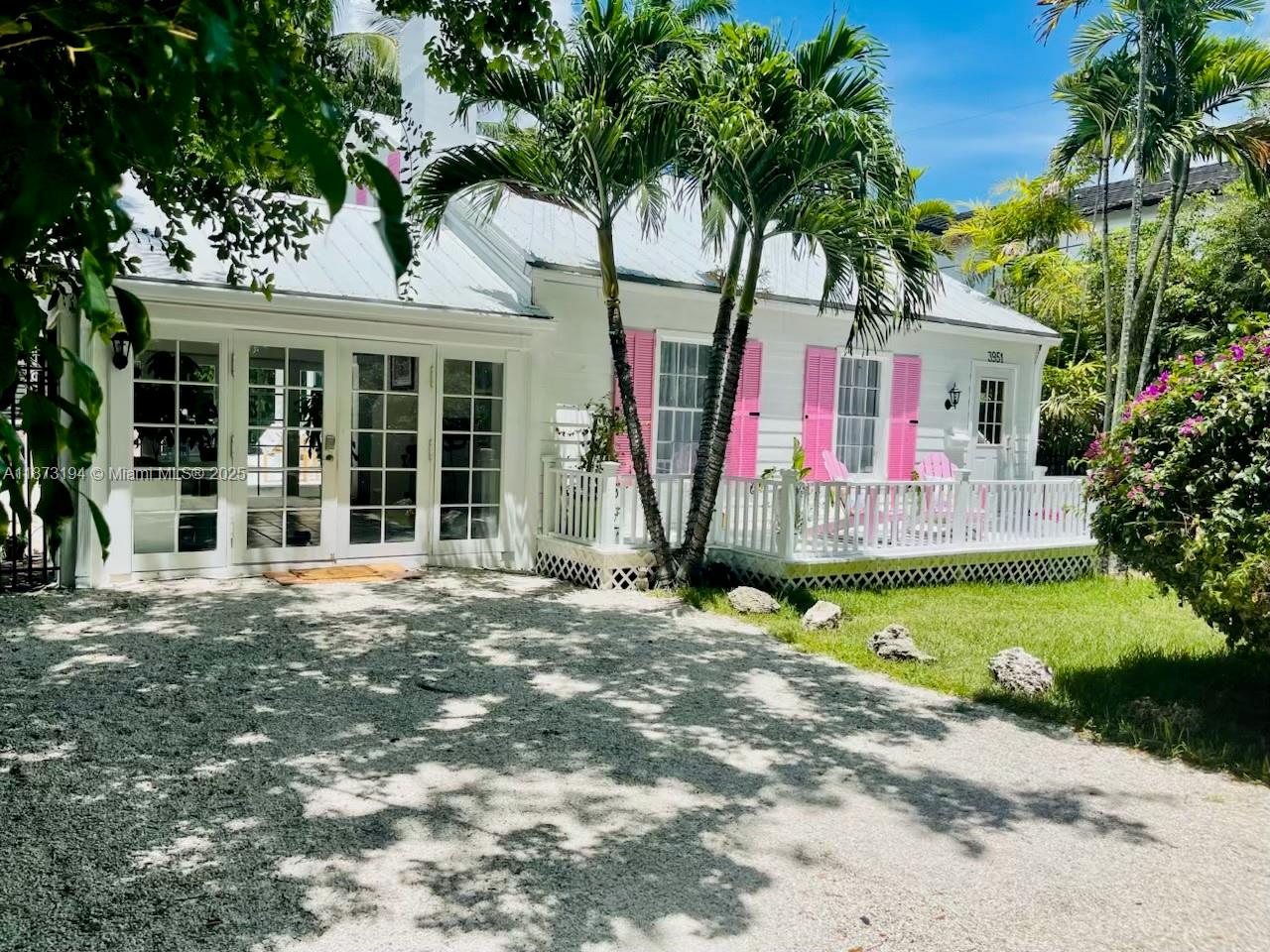 Welcome to the cutest cottage in Coconut Grove! Perfectly tucked away on a quiet one-way street. This newly renovated home blends classic charm with modern upgrades. Inside, you’ll find a spacious one-bedroom with an large oversized bath with glass shower and separate tub. Includes a light-filled Florida room perfect for an office, plus via an external staircase upstairs is a studio with its own full bath, ideal for guests, or a creative space. Thoughtfully finished with stainless steel appliances and beautiful natural light throughout. Step outside to a private yard with a large deck, hot tub, cold plunge, and outdoor shower. A serene retreat in one of Miami’s most desirable neighborhoods. Walk, bike to downtown village of Coconut Grove!
