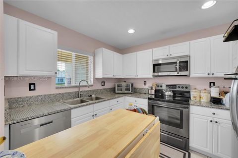 Photo of 5933 Glasgow Way, Tamarac, FL 33321 (MLS # A11917098)