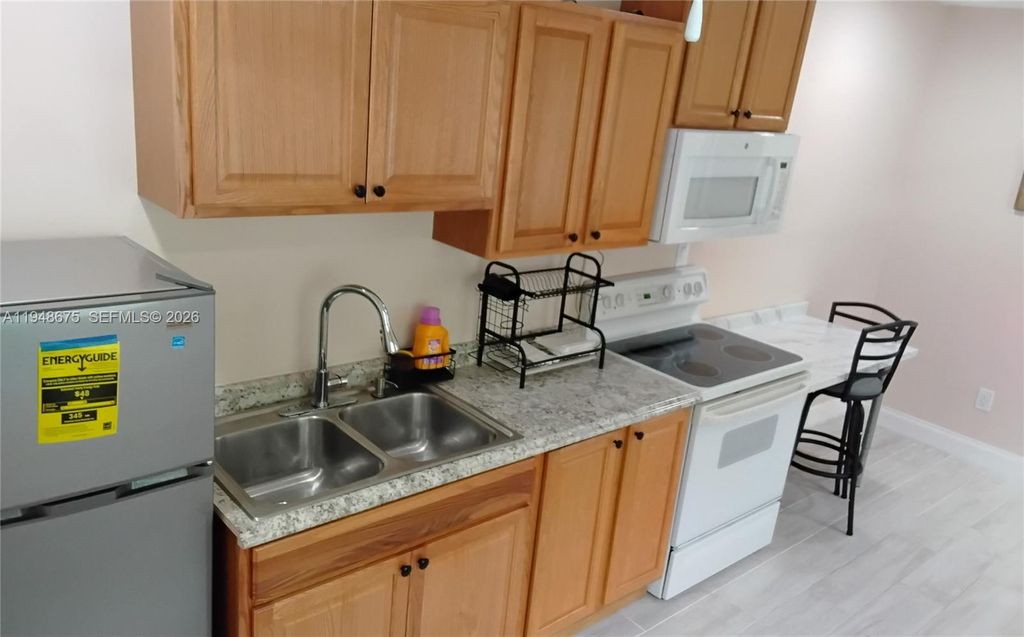 Photo of Lauderdale Lakes, FL 33319 (MLS # A11948675)