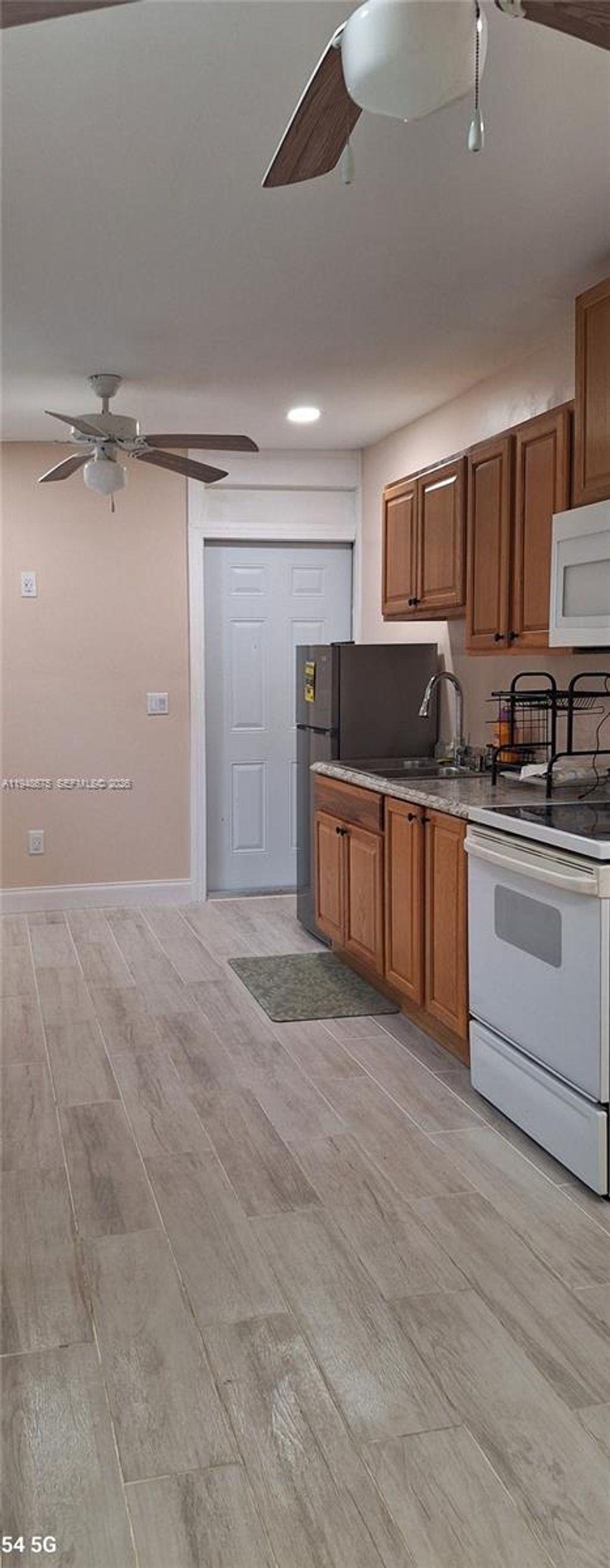 Photo of Lauderdale Lakes, FL 33319 (MLS # A11948675)