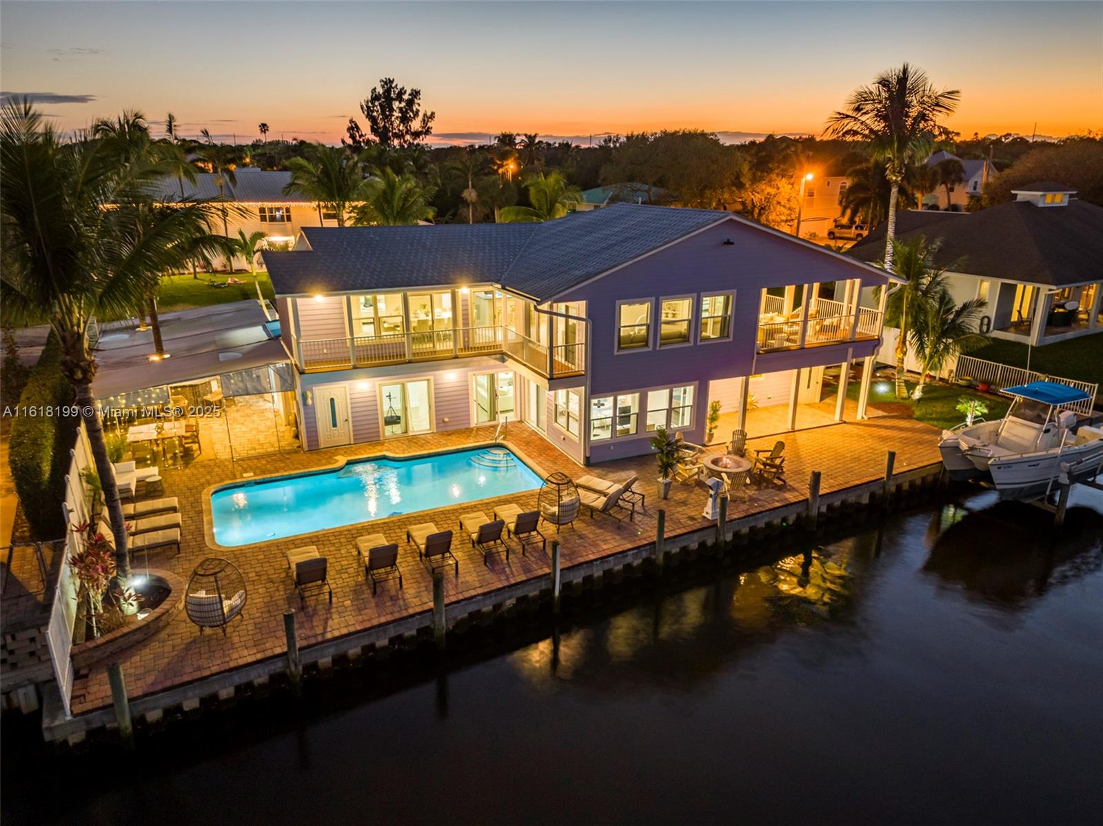 Hidden Jewel in Fort Pierce! This unique 6-bedroom, 4.5-bath deep waterfront Key West style home offers stunning water views, breathtaking sunrises and sunsets, and a tranquil, peaceful atmosphere. Perfect for boating with no fixed bridges and ocean access in 5 minutes.
The beautifully renovated home features artistic concrete floors, Hardie-Plank exterior, impact windows, a metal roof, a saltwater pool, a boat lift, a sea wall, an elevated cabana, an outdoor bath, an elevator, and an in-law suite.
Enjoy a quiet, serene setting in a beautifully updated home that is perfect for a dream vacation, entertaining, or simply relaxing. Schedule your appointment today to see this extraordinary property!