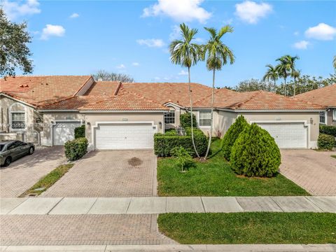 Photo of 7651 S Aragon Blvd #5, Sunrise, FL 33322 (MLS # A11934440)