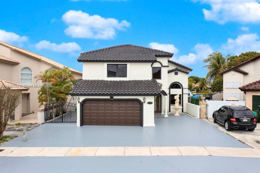 Discover the allure of this stunning West Kendall residence, a true gem waiting for you to call it home! Boasting 4 bedrooms and 3 bathrooms, the moment you step inside, you'll be greeted by its distinctive charm. Admire the graceful staircase and elegant light fixtures that adorn every corner. Step outside to the backyard designed for entertaining, featuring a functional outdoor kitchen, a refreshing pool, and a picturesque outdoor area overlooking a tranquil lake. With all-impact windows/doors, plus the convenience of a 2-car garage, this home offers both style and security. Nestled near top-rated schools like John A. Ferguson Senior High, Bowman Ashe/Doolin K-8, and Florida International University, this property is truly exceptional.