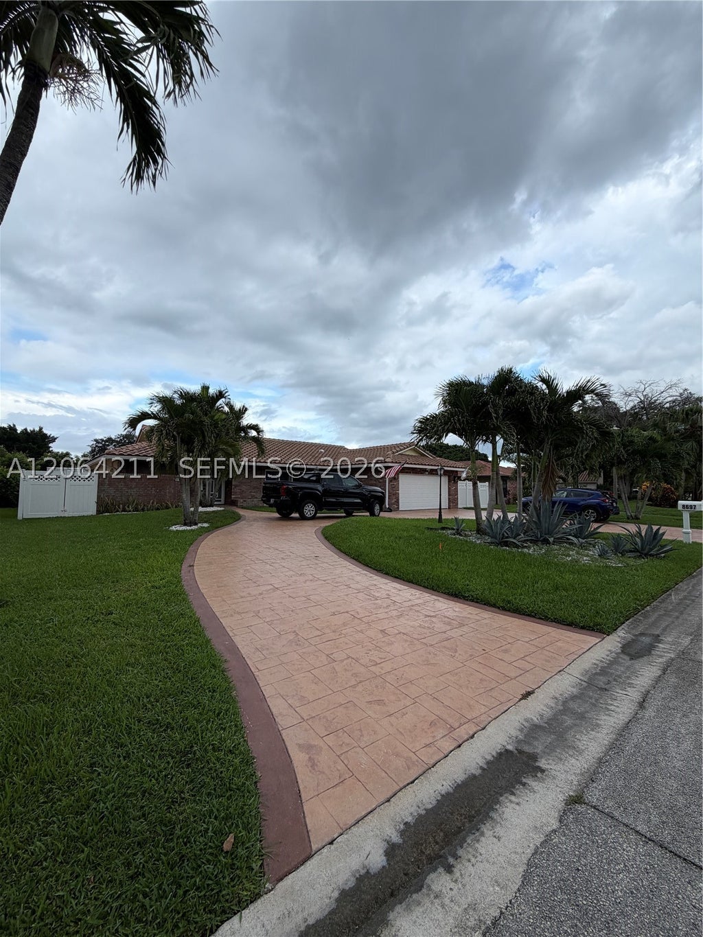 Photo of 8697 NW 1st St, Coral Springs, FL 33071 (MLS # A12064211)