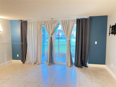 Photo of 6800 Cypress Rd #101, Plantation, FL 33317 (MLS # A11864604)