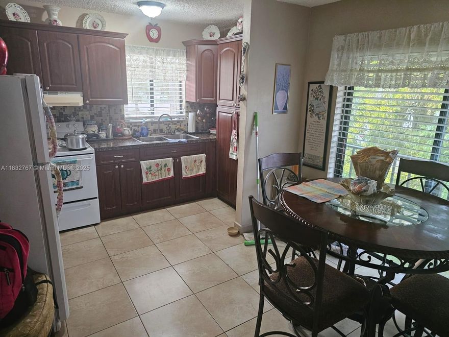 Rarely available Cozy 2-story condo with townhouse feel in central area of Hialeah. Unit comes with 2 conveniently located assigned parking spaces. Washer & Dryer in unit updated kitchen. Very quiet neighborhood, close to restaurants, schools, malls, markets, and much more. Investors and first buyers don't miss this opportunity.