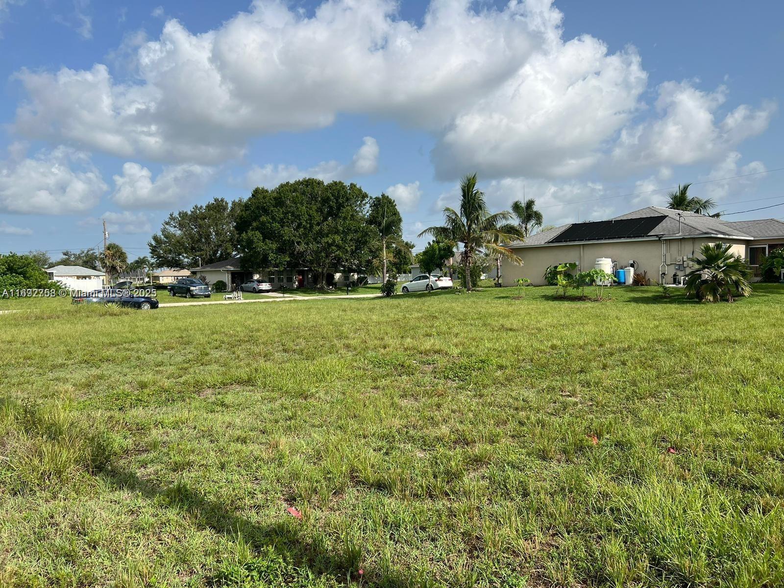 Oversized land 3 in 1 ready to built your dream home. Come and enjoy the tranquility that Cape Coral has to offer. Newer Community and newer homes, just few miles from the gorgeous beaches of the West Coast, famously known for their amazing white sands. This area already has all the infrastructure, business, shopping plazas, entertainment and a great school district. Perfect to relocate your family or to build a summer home. Survey available. NO HOA.