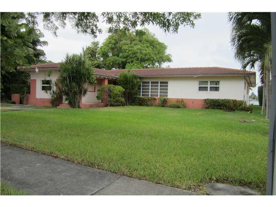 Best Bay Front house for sale in the Island. Incredible Sun Sets and panoramic City views. Mango tree with literally thousands of fruit year after year. Wood deck off of Master Suite. Wood Dock on Bay to relax. The house is larger than County Tax rolls. G reat potential for remodeling or reconstructions a most see home. Please show proof of Funds or Approval letter from Bank before setting apt. Walking distance to the Beach easy access to shops & major roads.