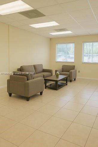 Office / Warehouse (Flex Space) Featuring a High Loading Door in the back Warehouse. Bathroom on the 1st and 2nd Floor. Great Location in the Kendall Area near Tamiami Airport