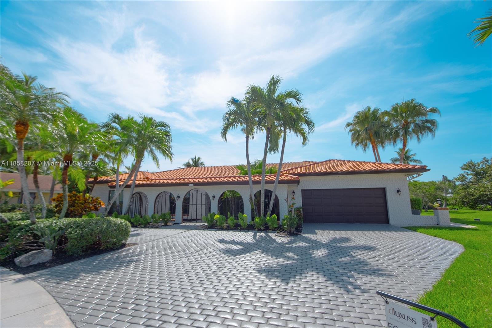 Experience refined living in this upgraded 5BR/3BA, privately situated on a 21,392 sq. ft. lakefront cul-de-sac lot, No HOA. Designed with timeless style and modern comforts, this home offers an unmatched lifestyle.The primary suite boasts tranquil views, a spa bath with dual rainfall showers, an automated TOTO toilet. The chef’s kitchen features custom cabinetry, quartzite counters, pot filler, premium appliances, and a butler’s station with wine refrigerator and beverage cooler. Impact windows, tile flooring throughout in grey/taupe, high-efficiency A/C, tankless water heater, propane tank with generator, and a climate-controlled 2-car garage. Outdoors, enjoy an oversized pool with extended awning, built-in BBQ, dock on the lake, sauna, lush landscaping with uplighting, & an RV outlet.