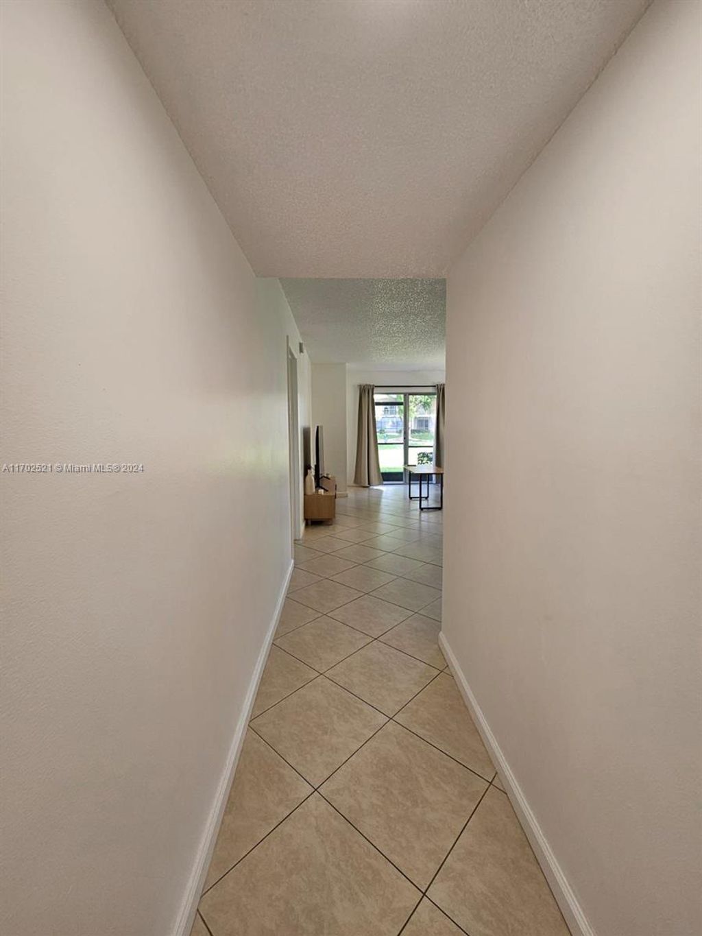 Photo of 4123 NW 88th Ave #104, Coral Springs, FL 33065 (MLS # A11702521)