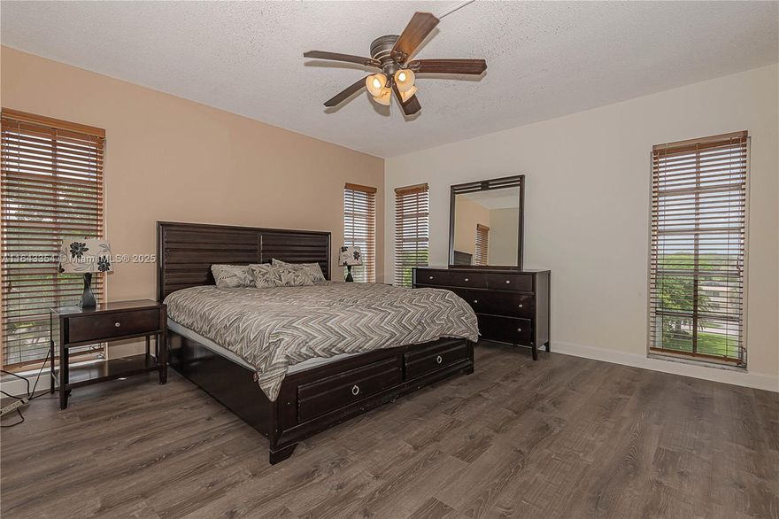 DELUXE CORNER UNIT WITH EXTRA WINDOWS - EASY TO SHOW - ALL AGES - 40 YEAR CERTIFICATION DONE - NO SPECIAL ASSESSMENT - FREE GOLF - THREE COURSES OF VARYING DEGREES OF DIFFICULTY - MOTIVATED SELLER - PRICED BELOW MARKET VALUE - ENTERTAINING ALL OFFERS - APPRAISAL CONTINGENCY OK - TRIPLE VIEWS WATERFRONT/POOL/GOLF - ELEVATOR BLDG - INTERCOM TO BUZZ IN LOBBY - WI-FI CABLE & WATER INCLUDED IN MAINTENANCE - FURNITURE IS NEGOTIABLE - OWNERS SUITE WITH EN SUITE BATH - WINDOWS IN BOTH BATHS - WINDOW IN KITCHEN - DISHWASHER - SECURITY PATROL - RESORT STYLE LIVING - HEATED POOL - PICKEL BALL - GYM - TENNIS -WALKING/BIKING PATHS - PLAYGROUND - BBQ GRILLS - CLUBHOUSE - NEAR CASINO - TOP GOLF - PUBLIX IN COMPLEX - PARK IS MANAGED BY BROWARD PARKS AT A VERY LOW COST FOR MEBERSHIP BASICALLY PENNIES A DAY