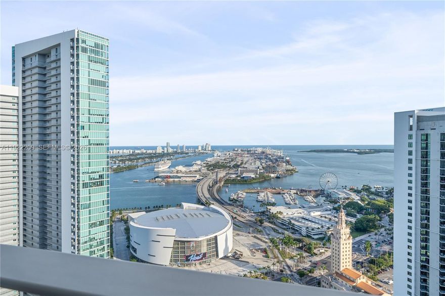 High-floor corner residence featuring 3 bedrooms plus den (easily convertible to a 4th bedroom) and 4 full bathrooms, located in the heart of Downtown Miami within Miami Worldcenter. With East and South exposure, the home is filled with natural light and offers expansive Biscayne Bay views with beautiful sunrise light from the living areas and bedrooms. A spacious balcony enhances the sense of openness and elevation.

The primary suite features a spa-style bath with soaking tub, separate shower, and walk-in closet. All bedrooms are ensuite with custom closet build-outs, including a third bedroom with private entrance, ideal for guests or a home office. Additional features include private elevator foyer, Sub-Zero and Bosch appliances, electric roller shades and curtains throughout, one assigned parking space, one valet space, and one storage unit.

Walking distance to cafes, museums, arena, shopping, Metromover, Brightline, and the Arsht Center, with quick access to MIA Airport, Wynwood, Brickell, and the beach.

Amenities include two rooftop pools, three resort-style pools with towel service, spa with sauna, jacuzzi, red light therapy, massage chairs and beds, fitness center with boxing area, basketball, racquetball and tennis courts, yoga room, business center, party rooms, virtual golf, theatre room, and 24/7 valet, security, and front desk.