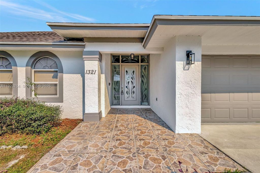 Photo of 1321 SE Airoso Blvd, Port St Lucie, FL 34983 (MLS # A11923754)