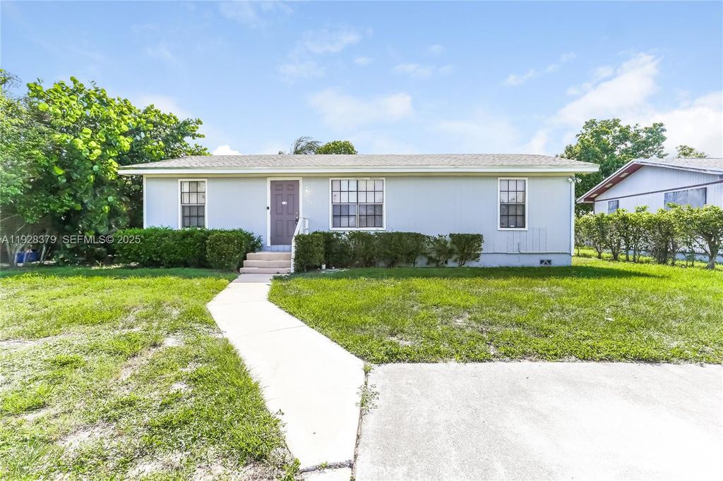 Photo of 7303 Thatcher Ave #0, Lake Worth, FL 33462 (MLS # A11928379)