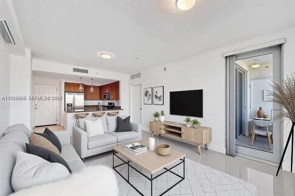 Photo of 1830 Radius Dr #609, Hollywood, FL 33020 (MLS # A11992688)