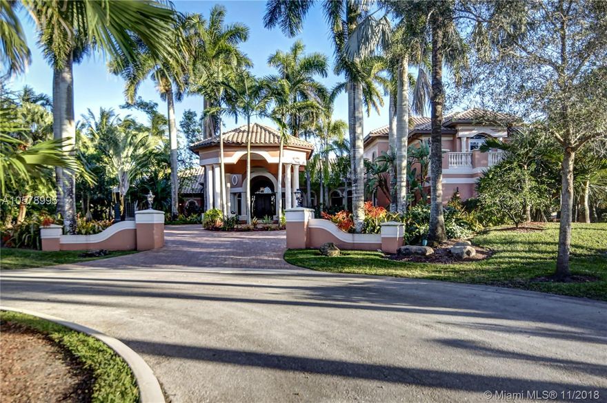 Absolutely exquisite smart home in the prestigious Windmill Ranch.Completely remodeled in 2007 over $1.5M in upgrades with a second floor addition. Meticulously maintained. gated community.Majestic entrance.Beautifully detailed interior overlooking from each window impressive views,lush landscaping,resort style pool,palm trees.Volume ceilings,artful accents.Billiard room w/spectacular wood floors.Gourmet kitchen/granite tops/custom cabinetry/center island/high-end appliances & casual dining area.Lavish master suite w large walk-in closets & spa style master bath.Cabana bath features a spa sauna & shower.This unique masterpiece has fine craftsmanship w exquisite finishes.Fully equipped Summer kitchen & gazebo entertains 20+ people,bar/appliances/TV. 3 car garage,driveway for guest parking.