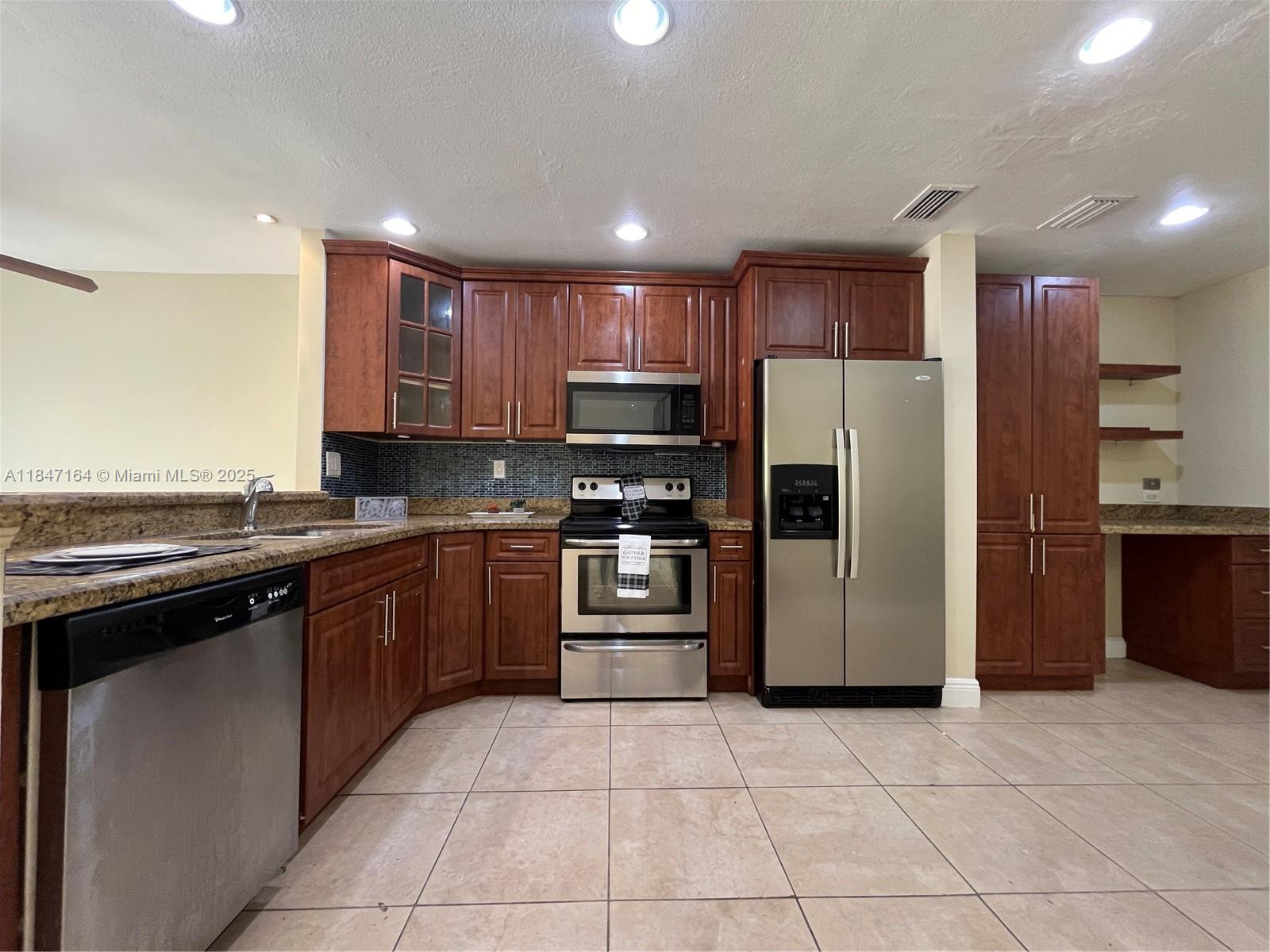 RARE & TURNKEY 3BR/2.5BA townhouse with garage and high-end finishes. Spacious layout with large private patio and second-floor balcony. Upgraded kitchen with granite countertops, stainless steel appliances, walk-in pantry, and built-in desk. Porcelain and wood flooring, remodeled bathrooms. Located in a desirable community with low HOA, pool, and tennis courts. HOA funds were used for major renovations; tennis court, lighting, pool heaters/pump, clubhouse, streets, fences, and 2020/2021 roof. HOA only covers common ground. No HOA reserves. Proof of funds and advanced scheduled required as tenant in place paying $2,700/month through 10/2025.