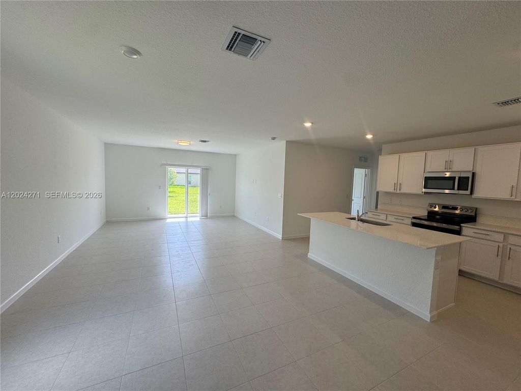 Photo of 693 Carlyle Way, Fort Pierce, FL 34947 (MLS # A12024271)