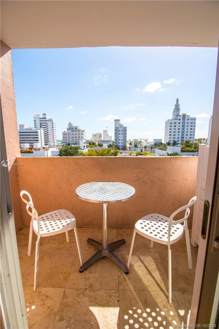 Beautifully furnished/equipped one bedroom with a huge bonus, an extra den with queen Murphy bed for guests, 1.5 bathrooms! Catch gorgeous ocean views between buildings from this impeccable, facing east, large, The perfect south beach pad has 979 under a/c SF, comes with hard wood floors, modern kitchen with breakfast bar, impact glass windows, central a/c, 1 parking space with inexpensive rentable 2nd space, plus visitors parking in the building. Very simple and quiet building on James ave yet 2 blocks from the ocean, Lincoln road, ocean drive, and all that South Beach has to offer! Laundry facilities in same floor. No pets allowed.