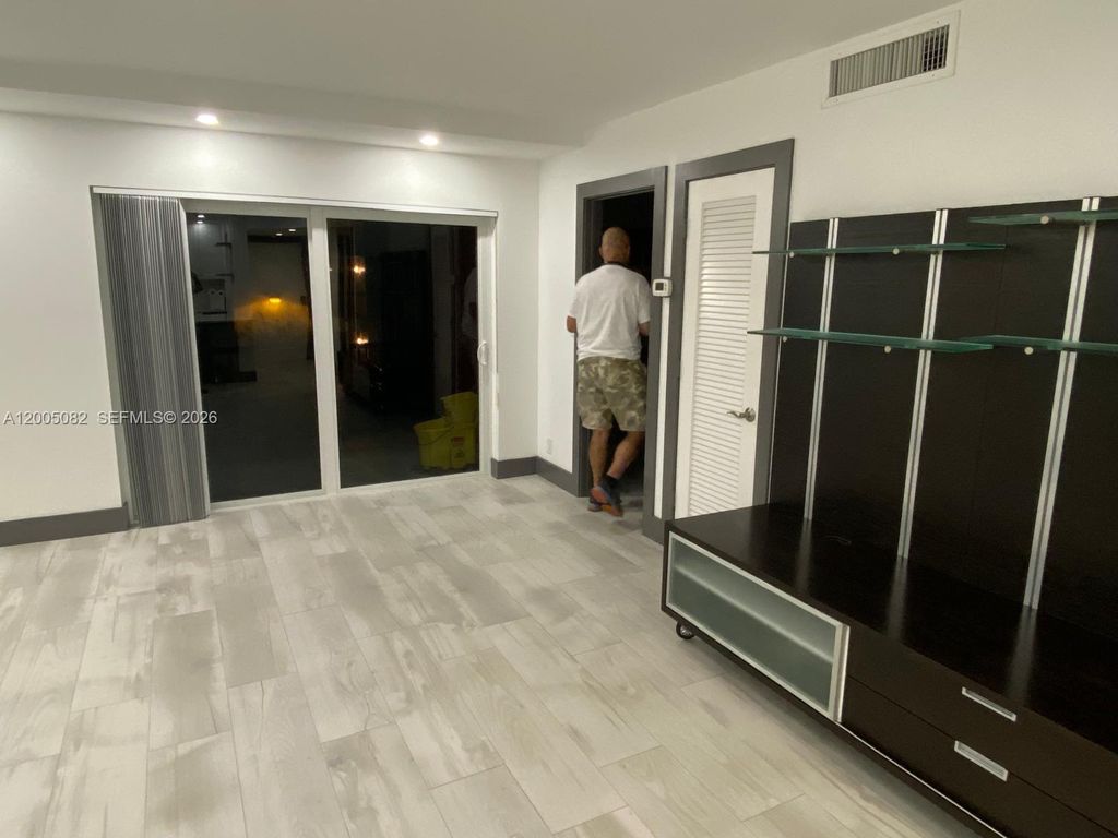 Photo of 660 Tennis Club Dr #205, Fort Lauderdale, FL 33311 (MLS # A12005082)