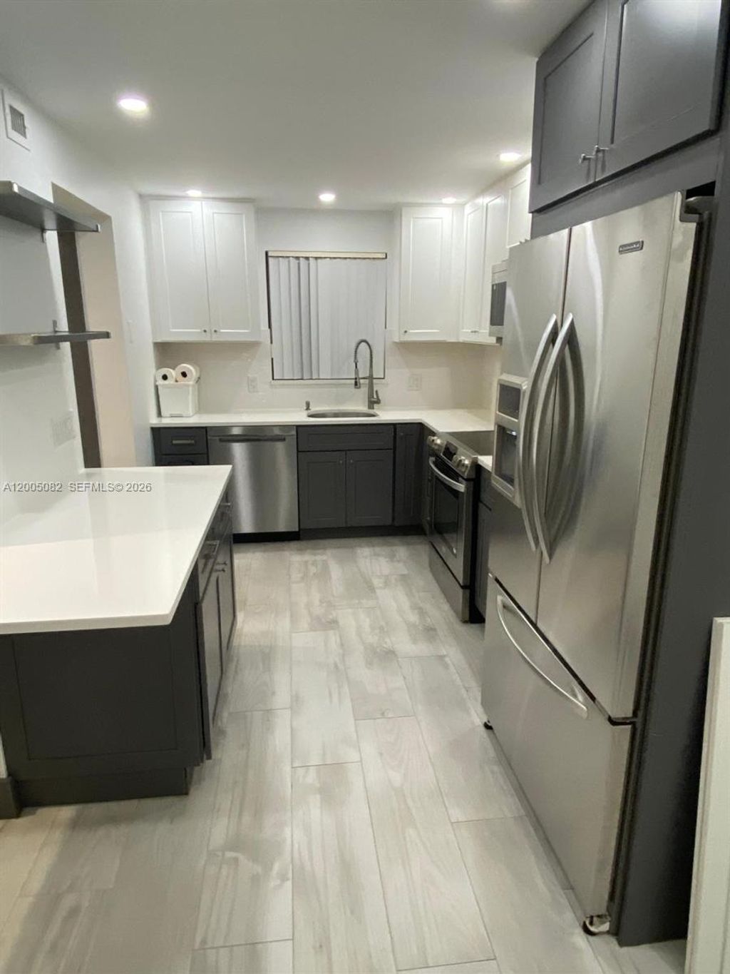 Photo of 660 Tennis Club Dr #205, Fort Lauderdale, FL 33311 (MLS # A12005082)