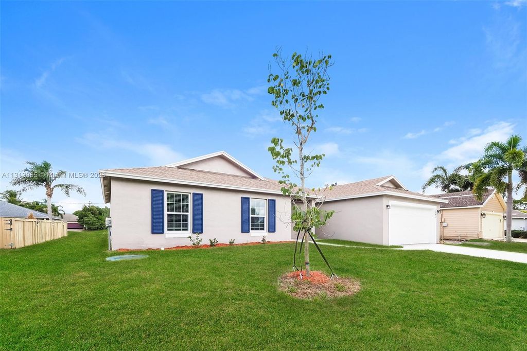 Photo of 1841 SW Open View Dr, Port Saint Lucie, FL 34953 (MLS # A11313065)