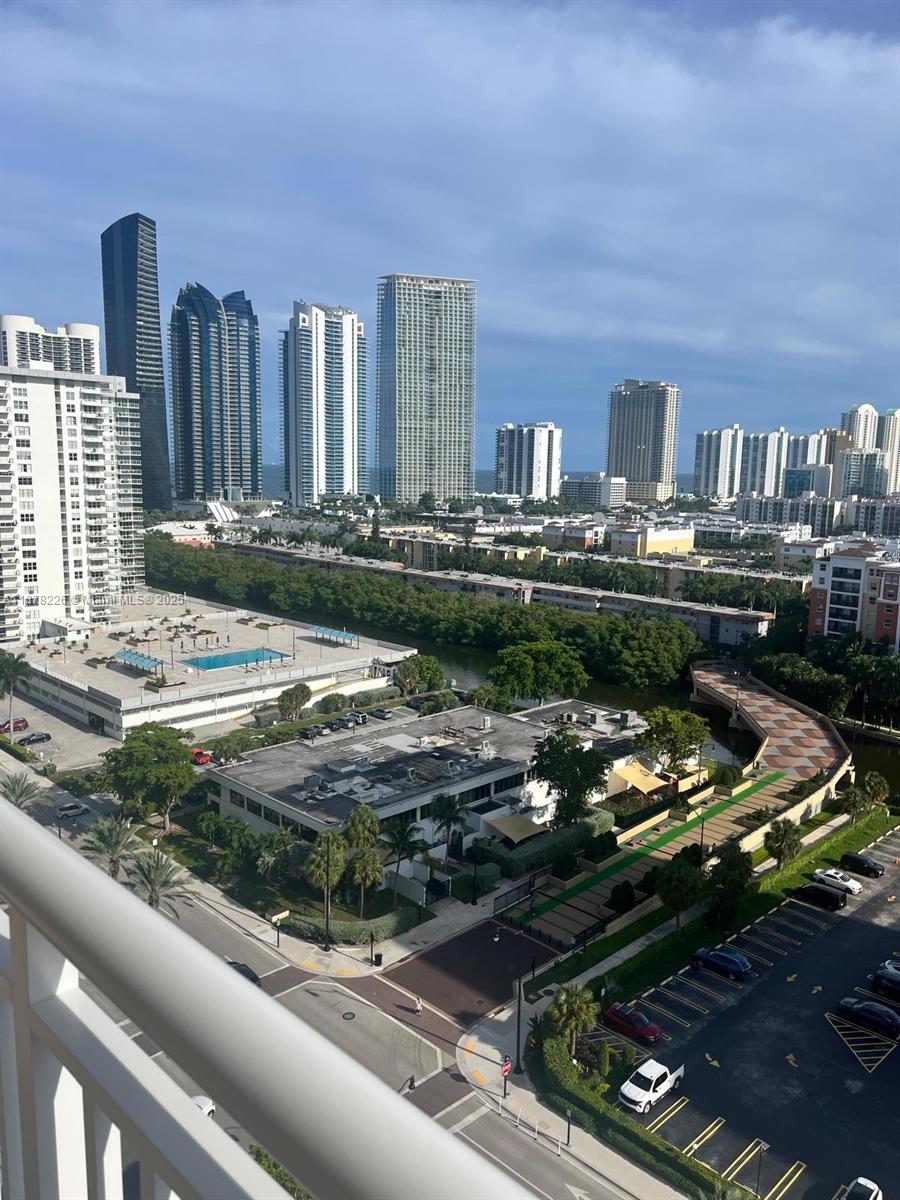 Spacious and beautifully renovated 1-Bed + Den, 1.5-Bath in the heart of Sunny Isles Beach! With 943 sq. ft., this residence offers a large south-facing balcony with stunning panoramic views of the bay, city, ocean, and skyline. The versatile den can be used as an office or extra bedroom. The building features great amenities including a gym, sauna, pool, and game room, with 24-hour security. Prime location—just minutes to the beach, parks, supermarkets, and top restaurants. Rent includes water, Internet, basic TV, and appliance services. Available furnished or unfurnished. Move-in ready! Contact listing agent for showings.
