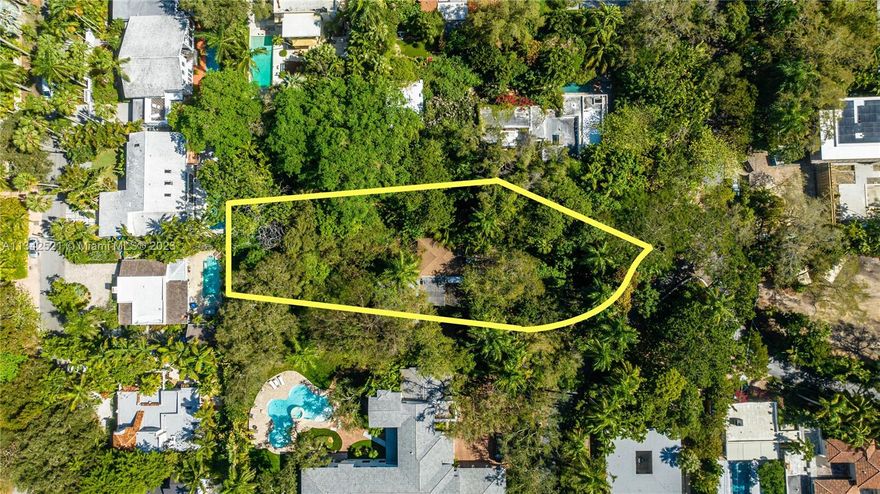 Coconut Grove Land Sale. Rare opportunity to purchase a 25,910 square foot lot in historic, gated Ye Little Wood – a fabled Miami community founded in 1883. The neighborhood encompasses just 33 homes along winding Little Ave, shaded and adorned by an iconic oak and banyan canopy. The property at 3803 Little Ave is set directly across the road from two designated historic homes, including that of Ye Little Wood founder’s son and 1920s Coconut Grove Mayor, John Little. The extraordinary location puts you strolling distance from everything that makes The Grove famous, beloved, and in high demand.