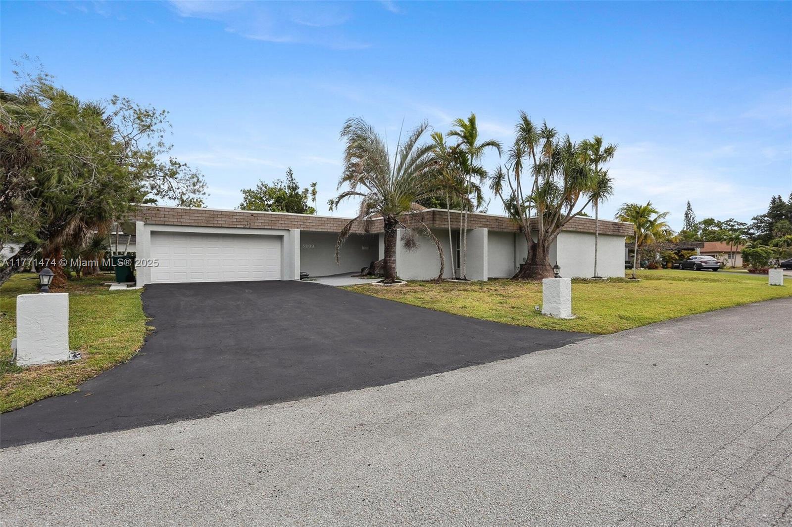 Property for Sale at 5209 Buttonwood Ct, Tamarac, Broward County, Florida - Bedrooms: 3 
Bathrooms: 3  - $599,900