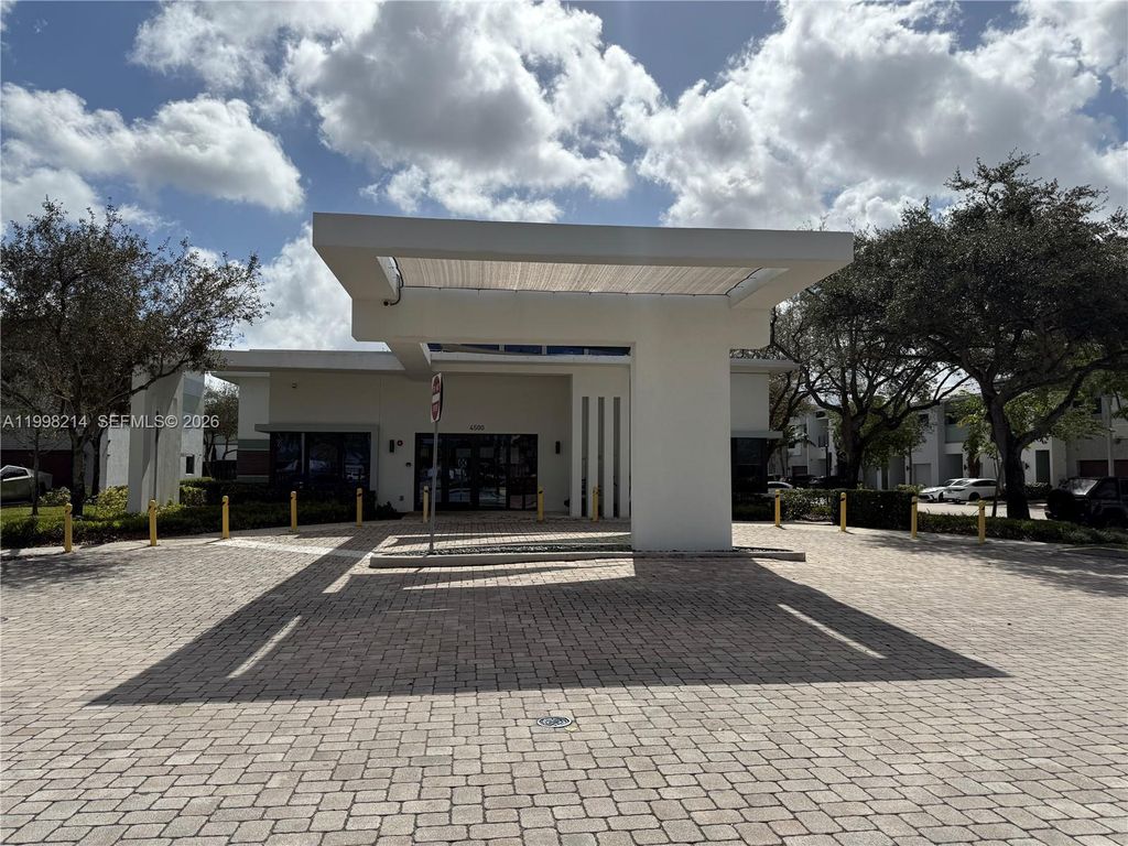 Photo of 4393 NW 9th St #4393, Plantation, FL 33317 (MLS # A11998214)