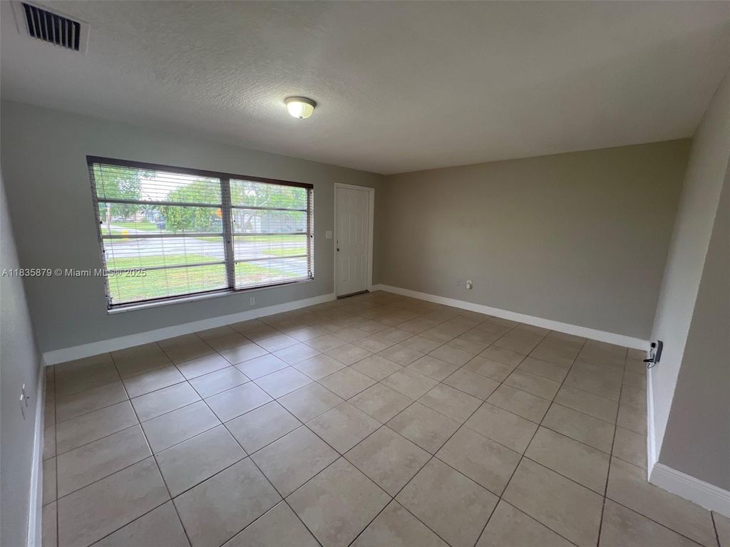 Photo of 6837 NW 28th St, Sunrise, FL 33313 (MLS # A11835879)