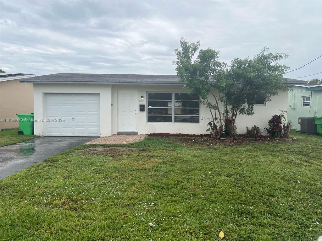 Photo of 6837 NW 28th St, Sunrise, FL 33313 (MLS # A11835879)