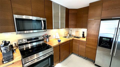 Photo of 2651 S Course Dr #307, Pompano Beach, FL 33069 (MLS # A11908952)