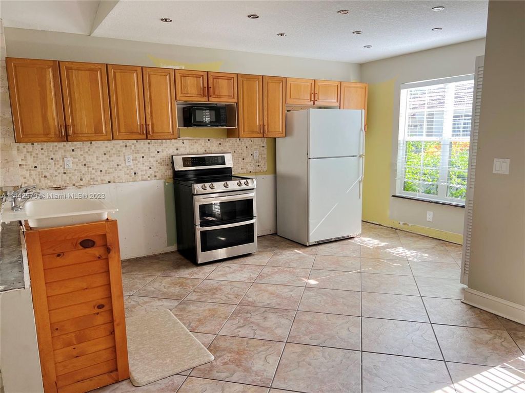 Photo of 5214 Edenwood Rd, Riviera Beach, FL 33418 (MLS # A11442570)